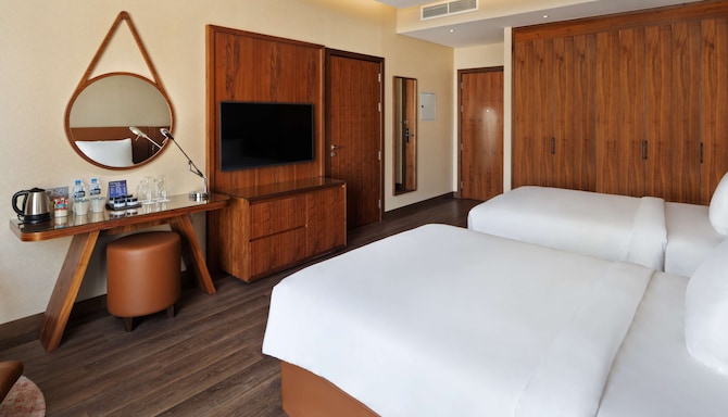 Radisson Blu Hotel, Dubai Canal View - Guest room with twin beds