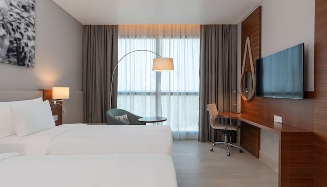 Radisson Blu Hotel, Juba - Executive Suite bedroom & Superior Room twin beds