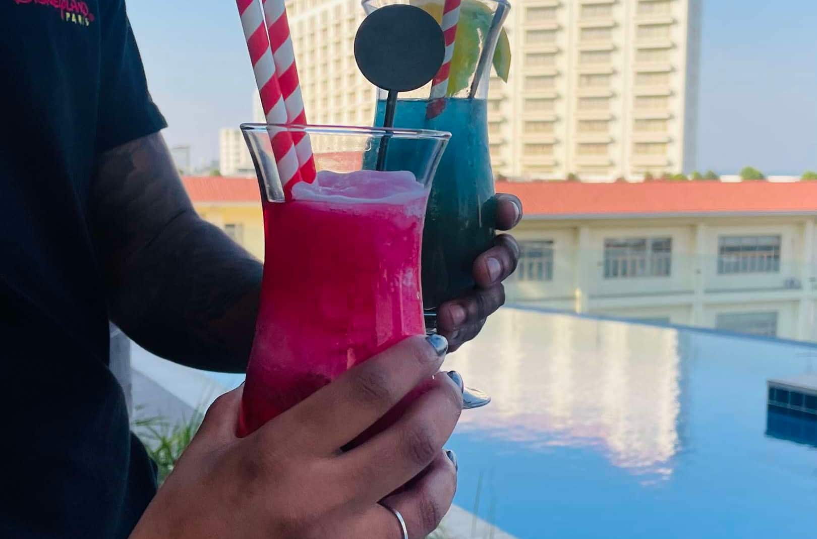 Couple holding cocktails