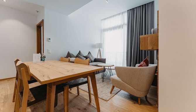 Radisson Blu Hotel, Reussen Andermatt - Two Bedroom Suite dining room