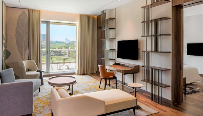 Radisson Blu Hotel & Spa, Nashik - Deluxe Suite with Balcony - Living Room