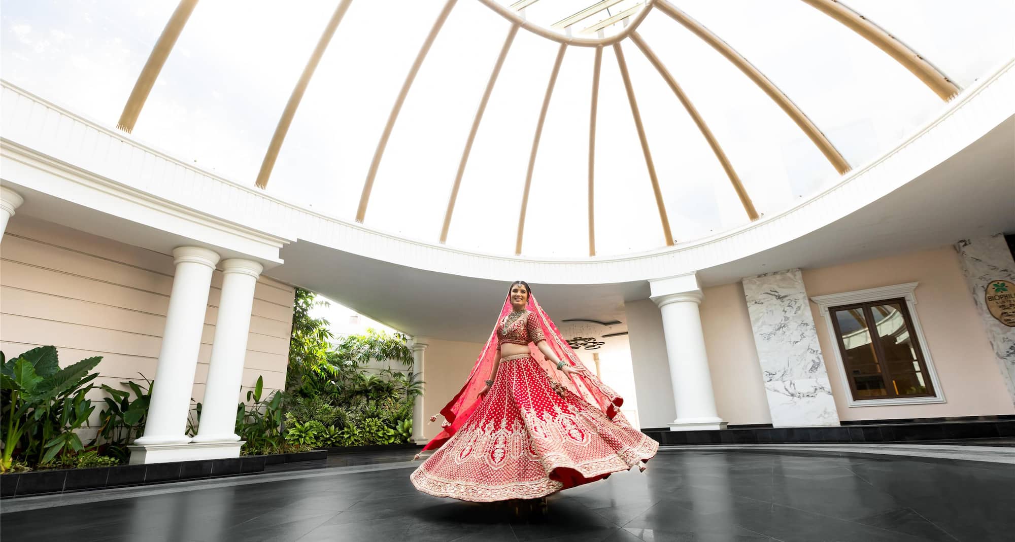 Radisson Blu Hotel and Suites GRT Chennai - Bride twirling