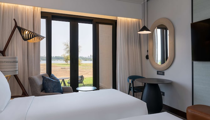 Radisson Blu Mosi-oa-Tunya Livingstone Resort-oa-Tunya Livingstone Resort - Villa Suite with terrace & Zimbabwe River view - twin beds