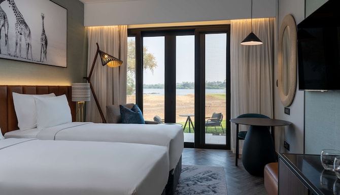 Radisson Blu Mosi-oa-Tunya Livingstone Resort-oa-Tunya Livingstone Resort - Villa Suite with terrace & Zimbabwe River view - twin beds