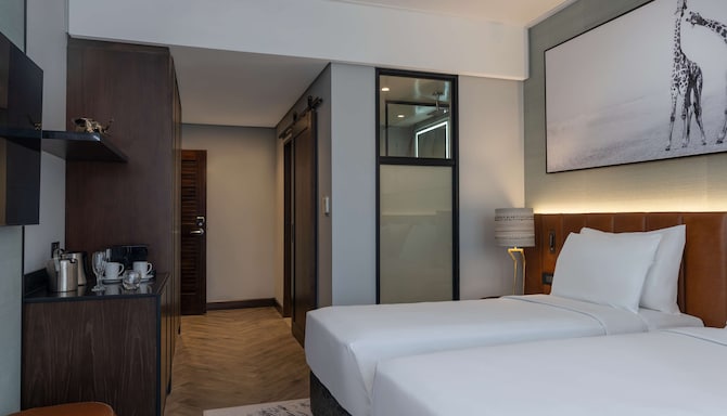 Radisson Blu Mosi-oa-Tunya Livingstone Resort-oa-Tunya Livingstone Resort - Villa Suite with terrace & Zimbabwe River view - twin beds