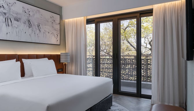 Radisson Blu Mosi-oa-Tunya Livingstone Resort - Suite with terrace & Zambezi River view