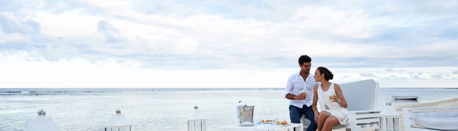 Radisson Blu Poste Lafayette Resort and Spa, Mauritius - Guests Drinking Cocktails at Sunset
