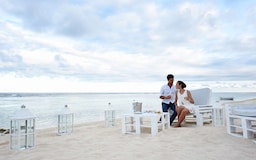 Radisson Blu Poste Lafayette Resort and Spa, Mauritius - Guests Drinking Cocktails at Sunset