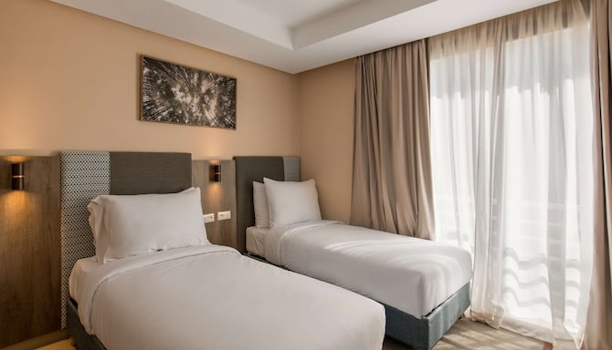 راديسون بلو ريزيدينس، الحسيمة، جناح بنغالو يضم ثلاث غرف نوم وتراس ويتميز بإطلالة على الحديقة