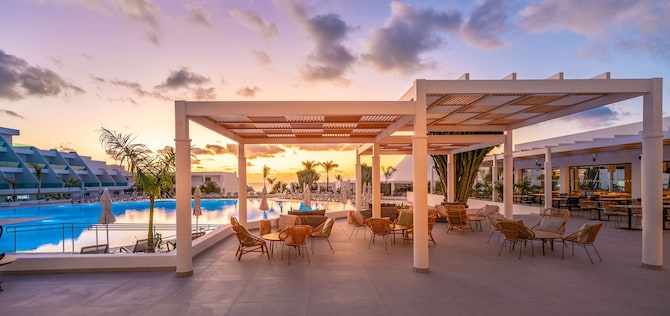 Radisson Blu Resort, Lanzarote - Pool terrace at sunset