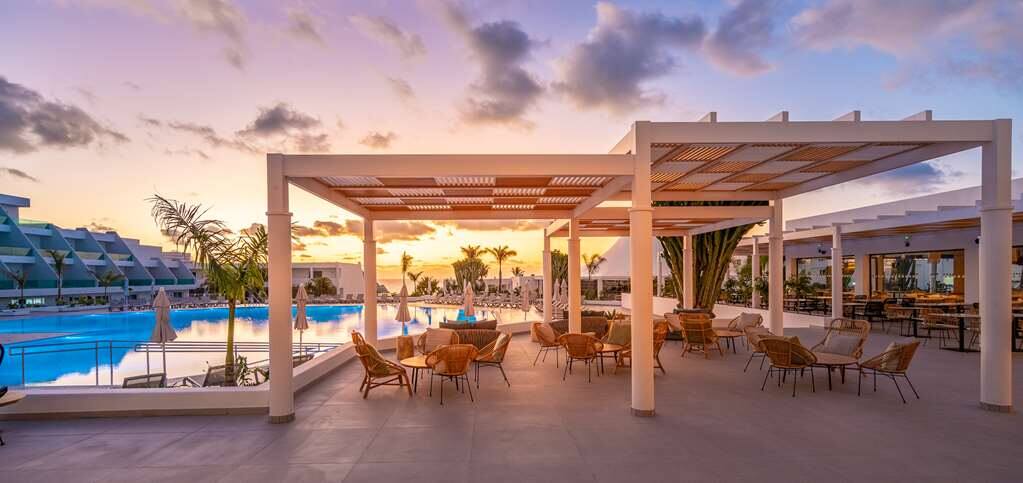 Radisson Blu Resort, Lanzarote - Pool terrace at sunset