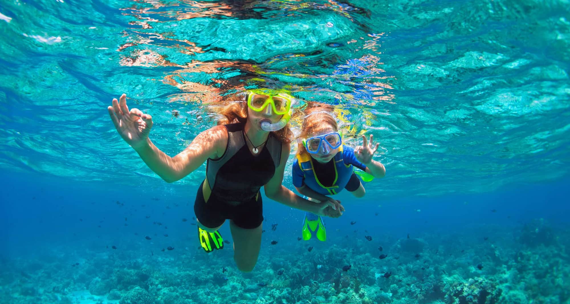 Radisson Blu Resort, Maldives - mother kid snorkeling in reef