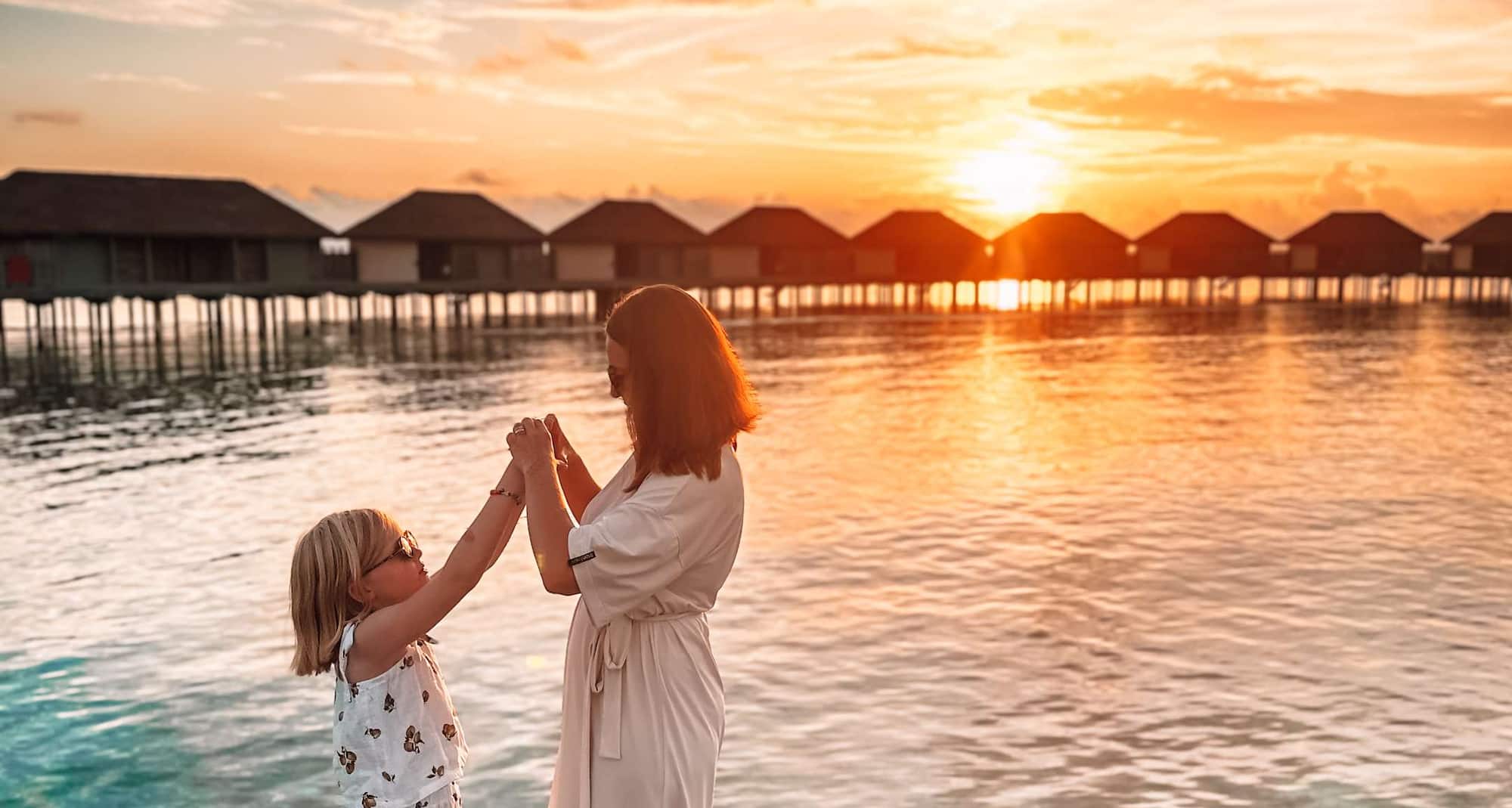 Radisson Blu Resort, Maldives - Mom and Daughter at jetty