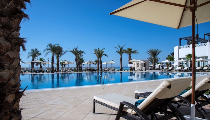 Radisson Blu Resort and Thalasso, Hammamet - Sunbeds by Swimming Pool