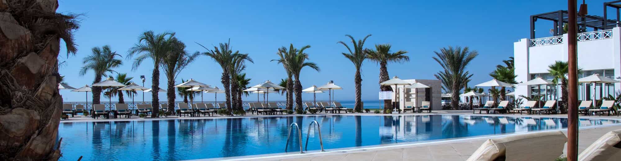 Radisson Blu Resort and Thalasso, Hammamet - Sunbeds by Swimming Pool