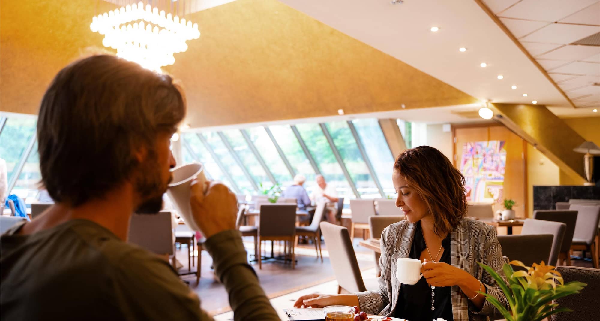 Radisson Blu Ridzene Hotel, Riga - Couple enjoying breakfast