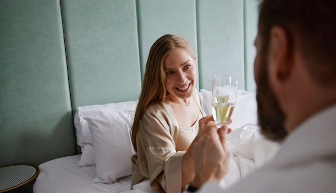 Radisson Blu Seaside Hotel, Helsinki - Radisson Blu Finland brand image couple and champagne