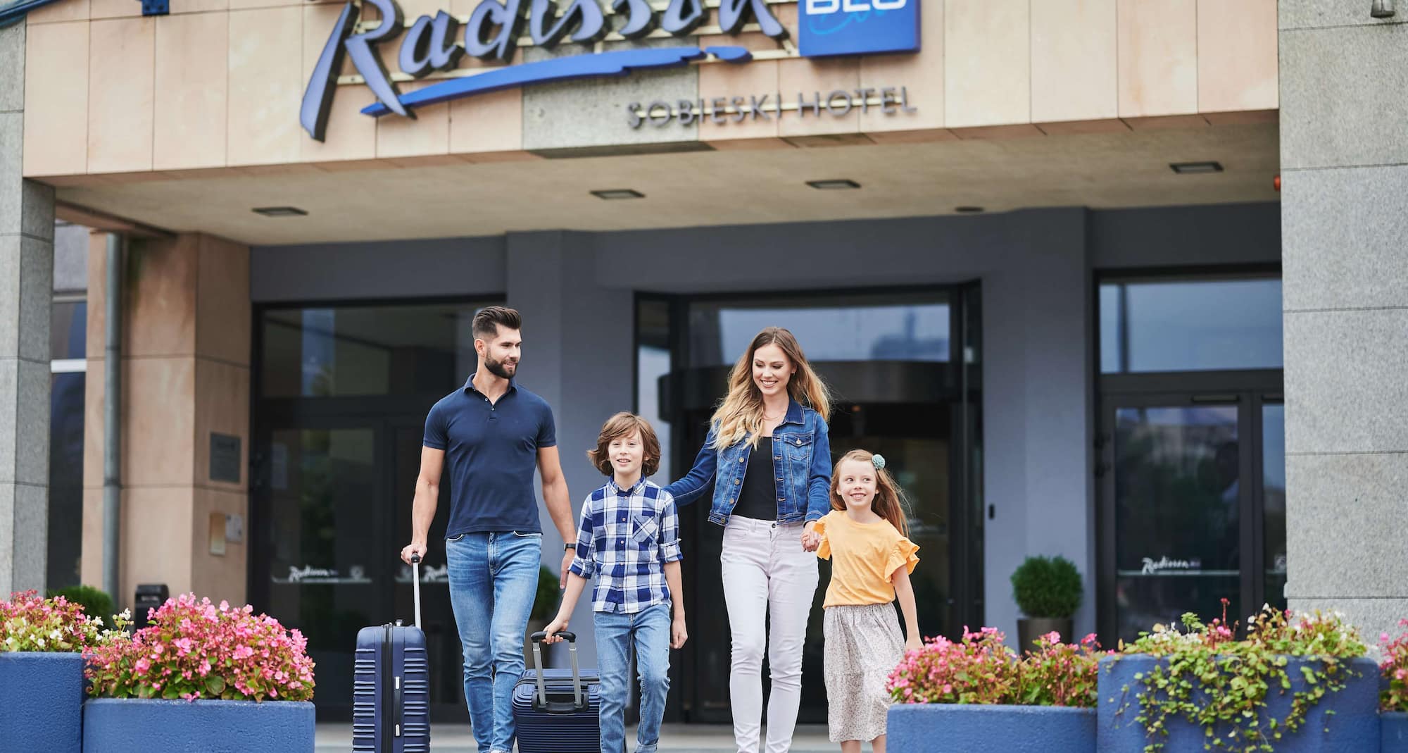 Radisson Blu Sobieski Hotel, Warsaw - Family in the front of the hotel