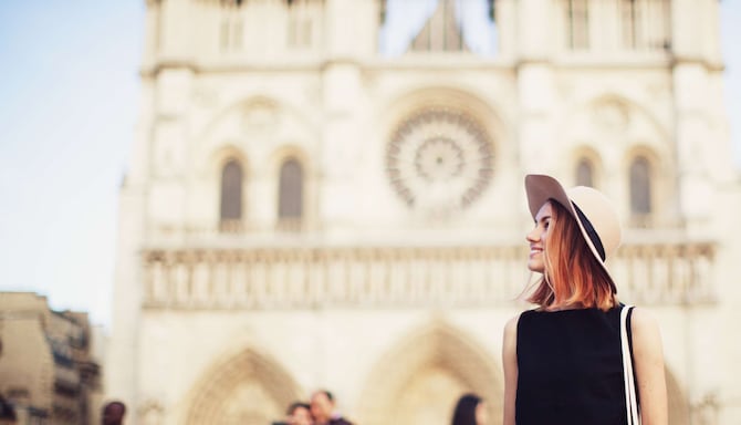 Radisson Collection Brand - Woman in front of Cathedral