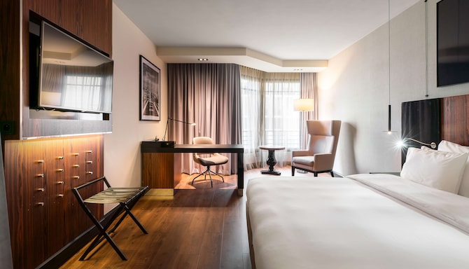 Radisson Collection Hotel, Grand Place Brussels - Collection Premium Room with desk, sitting area, and TV