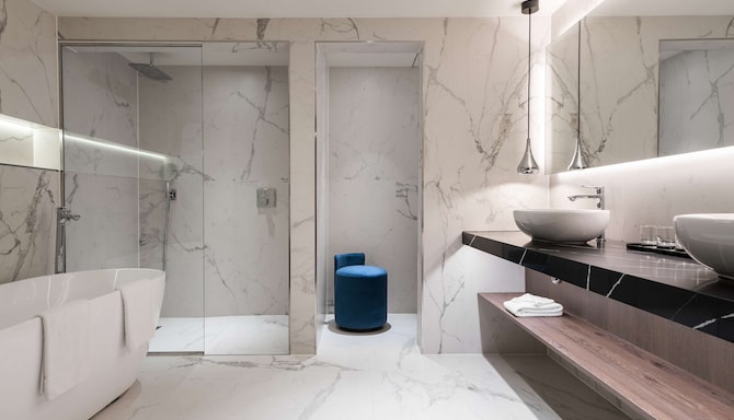 Radisson Collection Hotel, Grand Place Brussels - Presidential Suite bathroom with walk-in shower and bathtub