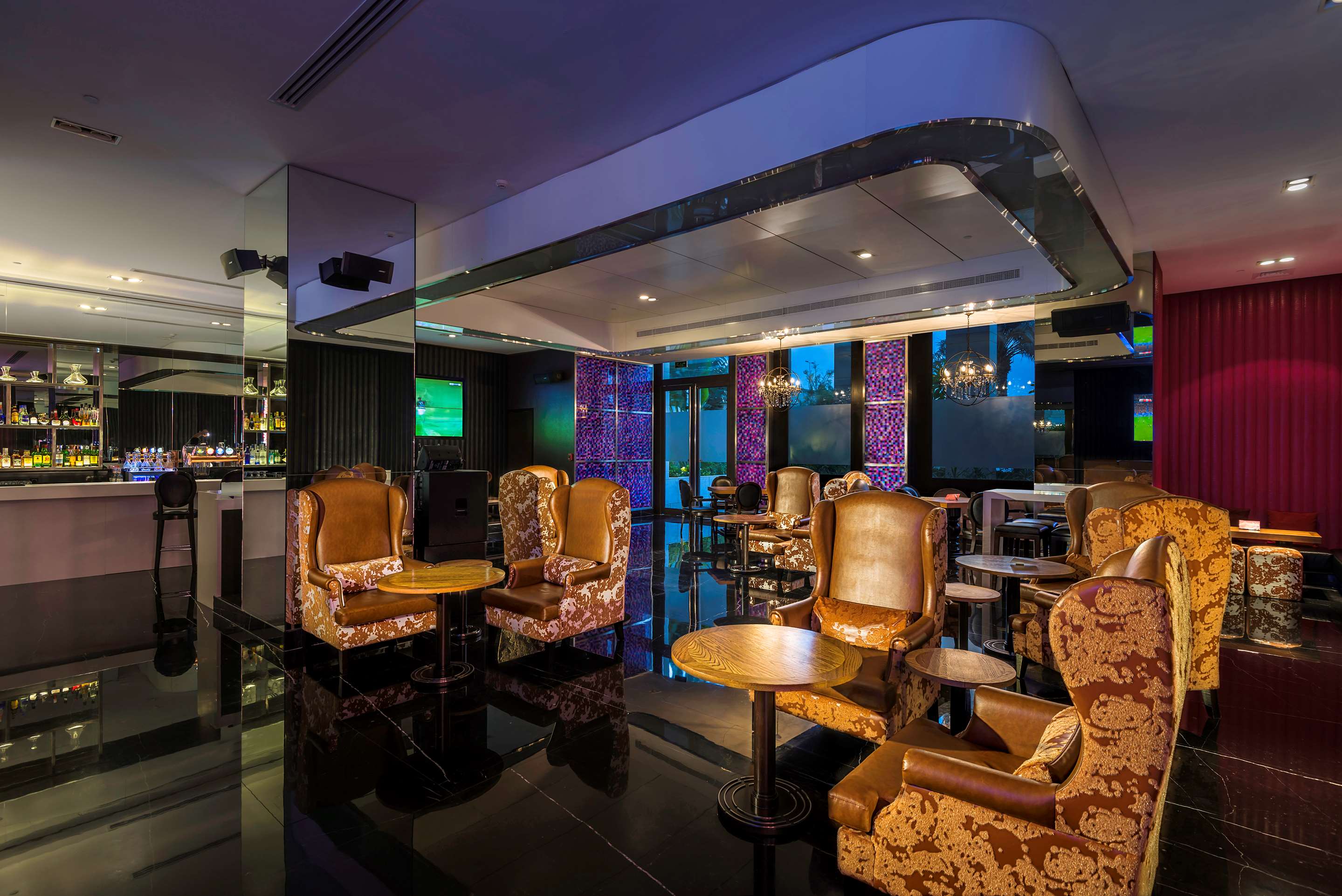 Visit our cocktail bar in Muscat - Book Today | Radisson Collection