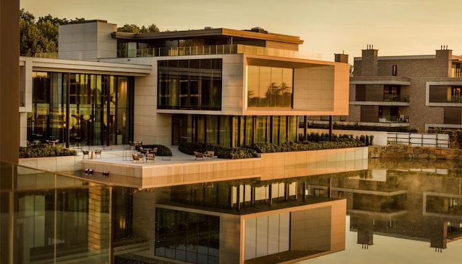 Radisson Collection The National Hotel, Brussels - Guest Room Lake View in sunset