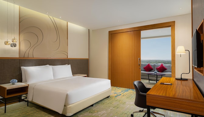 Radisson Golf & Convention Center Batam - One Bedroom Suite City View Bedroom