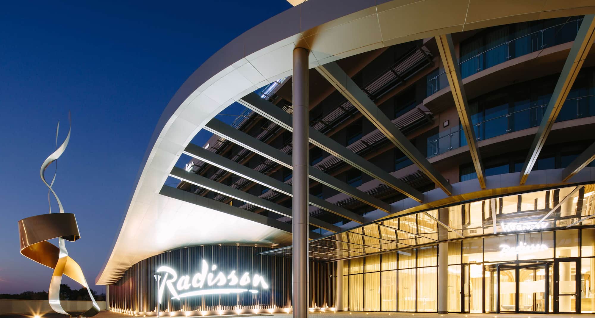 Radisson Hotel and Convention Centre OR Tambo Airport - Hotel Exterior night