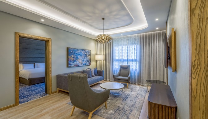 Radisson Hotel and Convention Centre OR Tambo Airport - Diplomatic suite - living are & bedroom