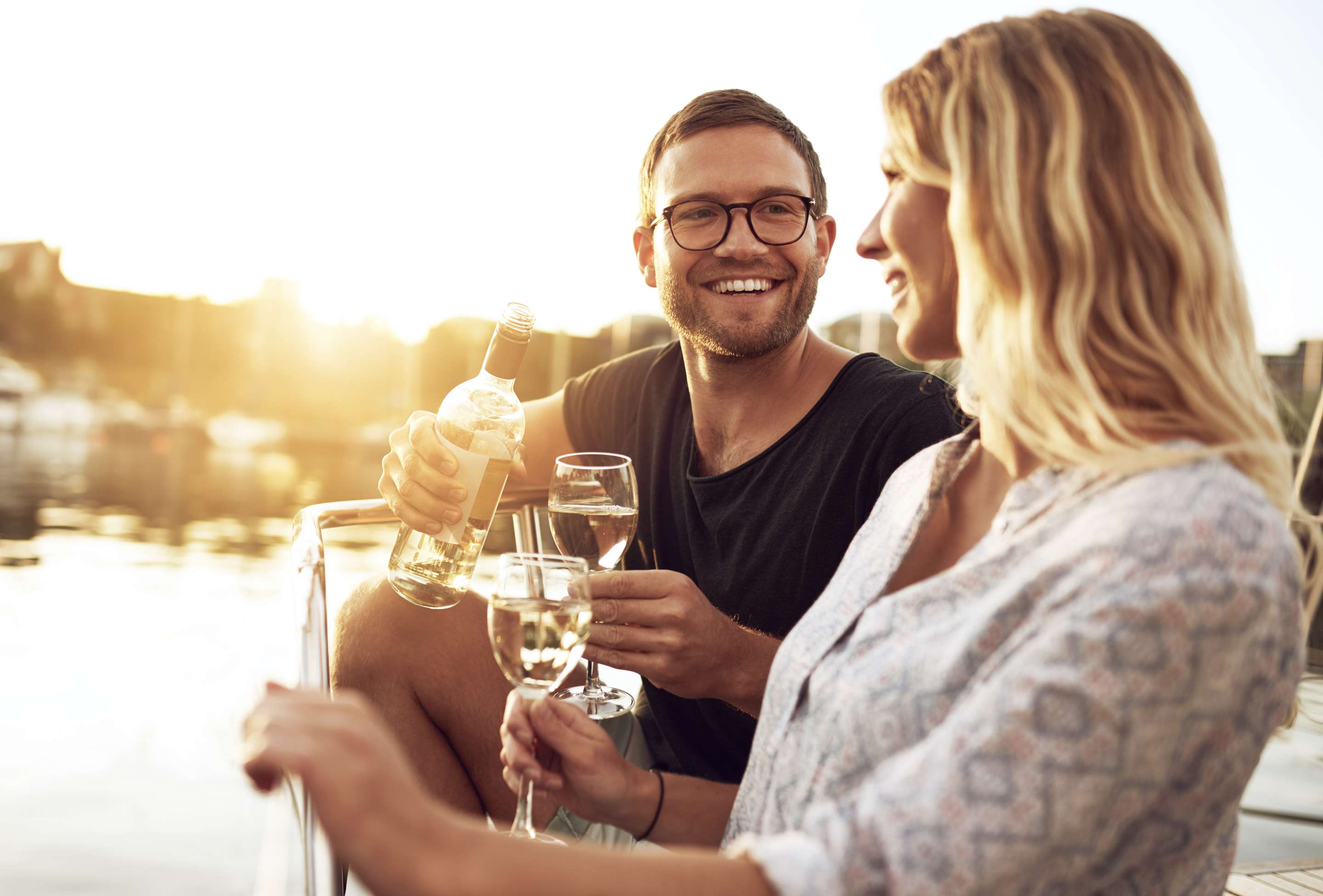 Radisson Hotel and Suites Sydney - Couple Sharing Wine