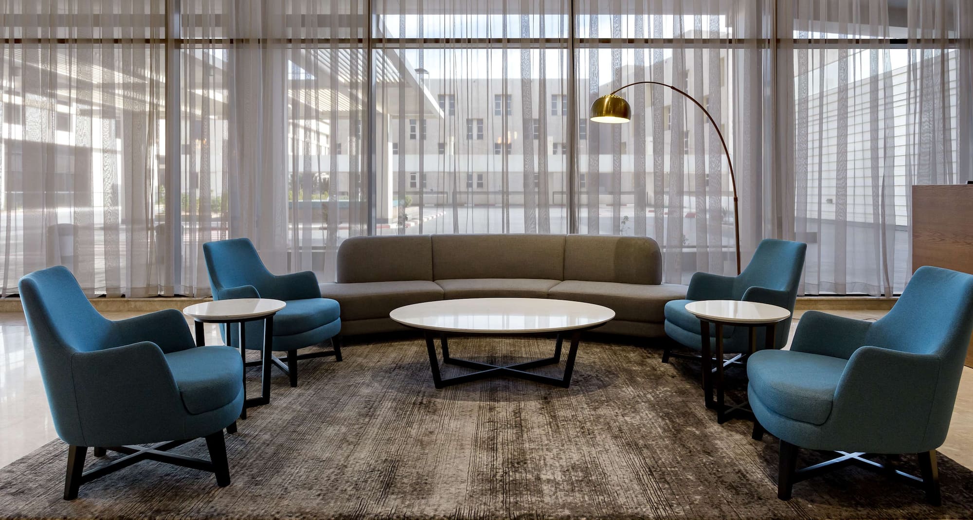 Radisson Hotel & Apartments Dammam Industrial City - Lobby - daylight