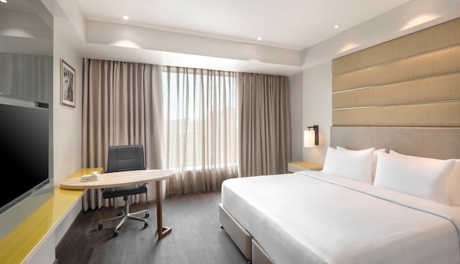 Radisson Hotel Bareilly Airport - Superior Room king size bed