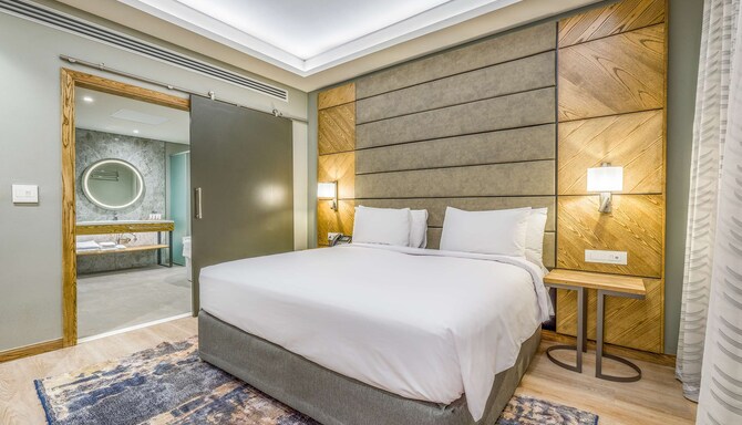 Radisson Hotel & Convention Centre Johannesburg OR Tambo - Deluxe suite - bedroom