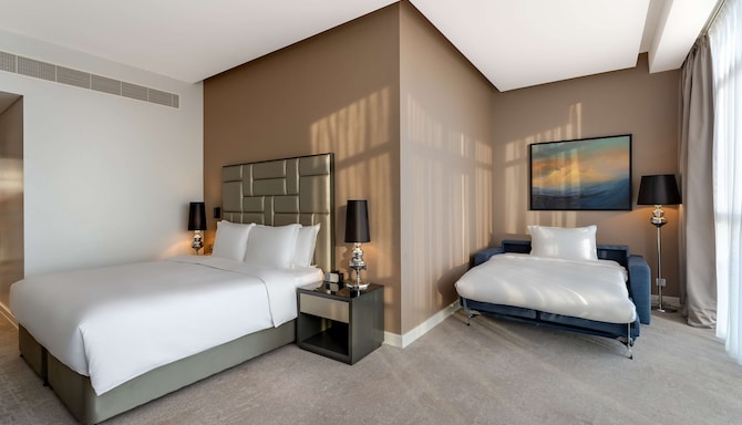 Radisson Hotel Dubai Damac Hills - Premium Room with extended sofa bed
