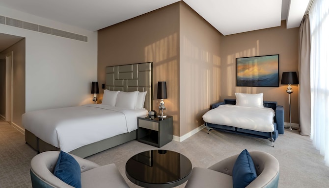 Radisson Hotel Dubai Damac Hills - Premium Room with extended sofa bed