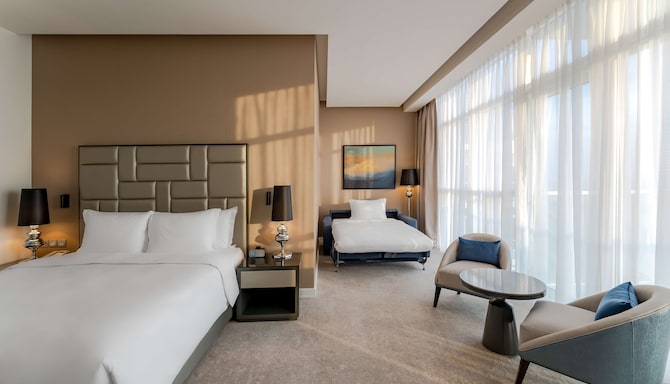 Radisson Hotel Dubai Damac Hills - Premium Room with extended sofa bed