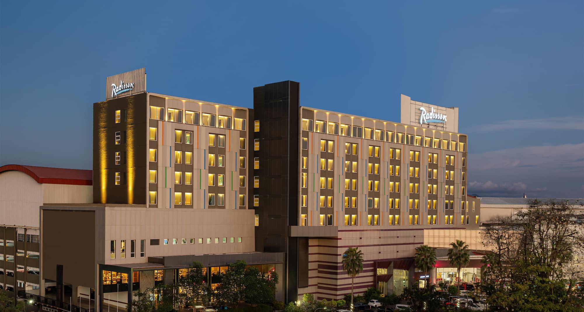 Radisson Hotel Lampung Kedaton - Façade at twilight