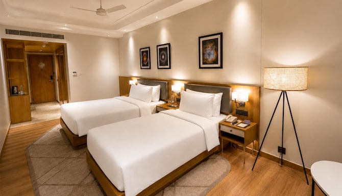 Radisson Hotel Nathdwara - Family Room Bed Area
