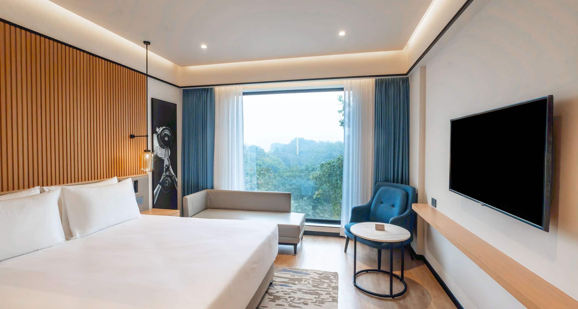 Radisson Hotel Prayagraj - Deluxe King Bedroom