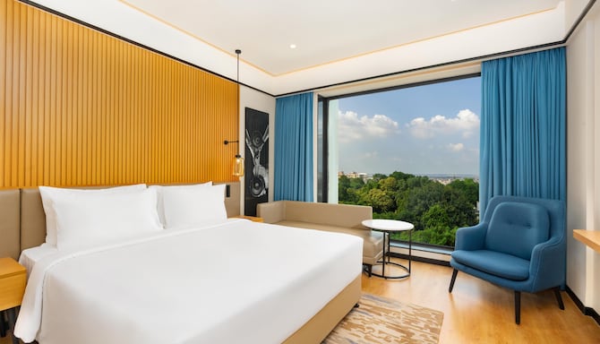 Radisson Hotel Prayagraj - Deluxe King Bedroom