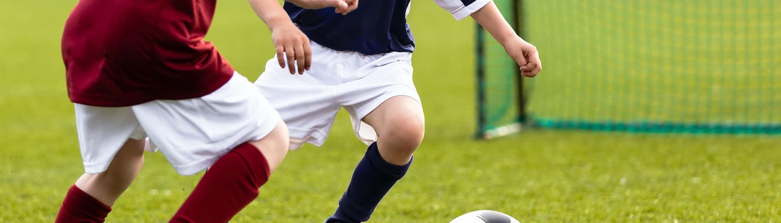 Radisson Hotels - Sports Approved - Children playing football