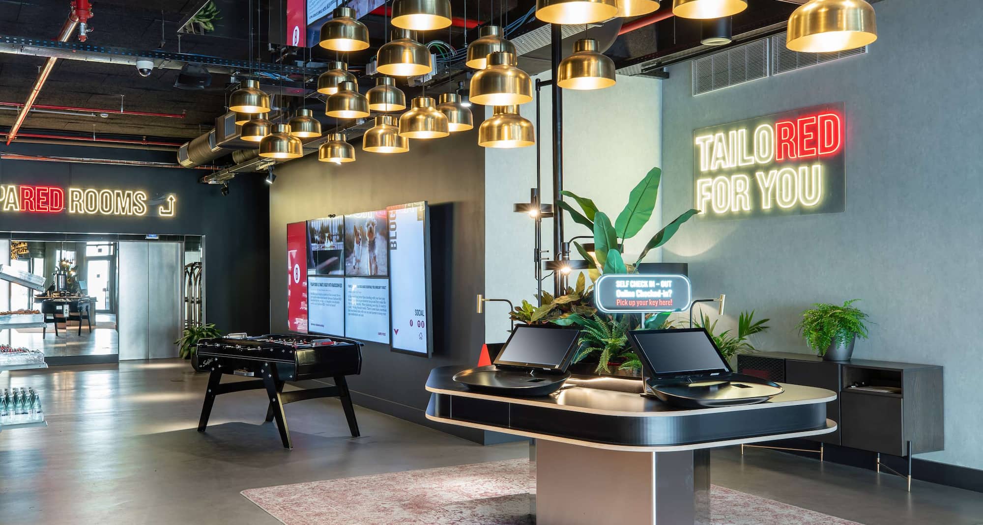 Radisson RED Brussels - Lobby, check in and out, digital screen, view towards elevators to guest rooms