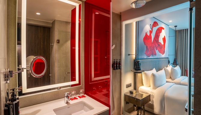 Radisson RED Indore - Superior twin bed & bathroom