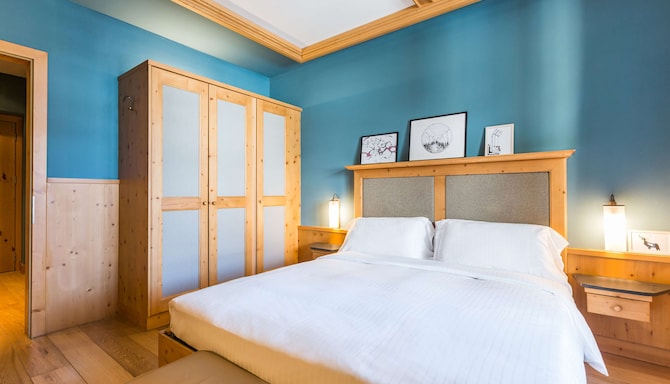 Radisson Residences Savoia Palace Cortina d'Ampezzo - Apartment bedroom