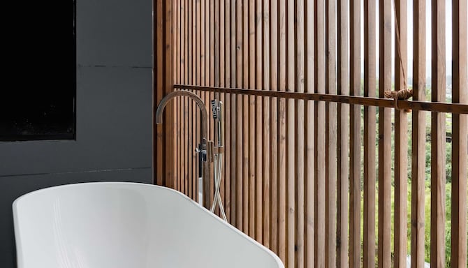 Radisson Resort and Spa Lonavala - Deluxe Room bathtub on balcony