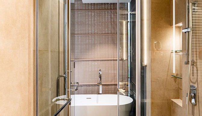 Radisson Resort and Spa Lonavala - Deluxe Room Twin Bed with bathtub