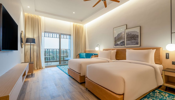 Radisson Resort Hatgad Saputara - Deluxe Room with twin beds