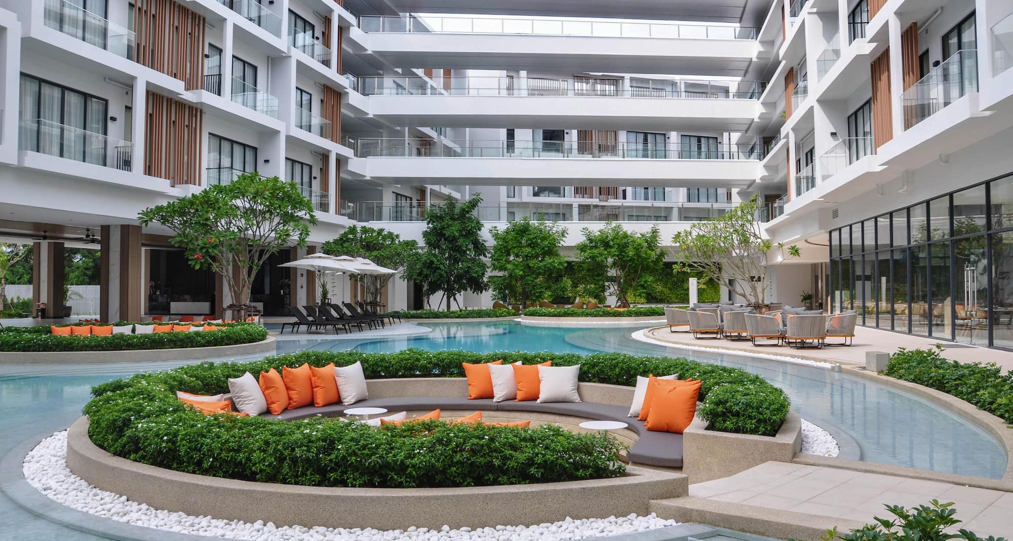 Radisson Resort Layan Phuket - Pool lounge and hotel view