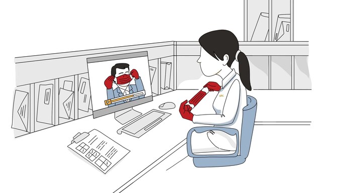 Un’illustrazione disegnata di un membro del personale dell’hotel mentre guarda un video formativo su un computer.